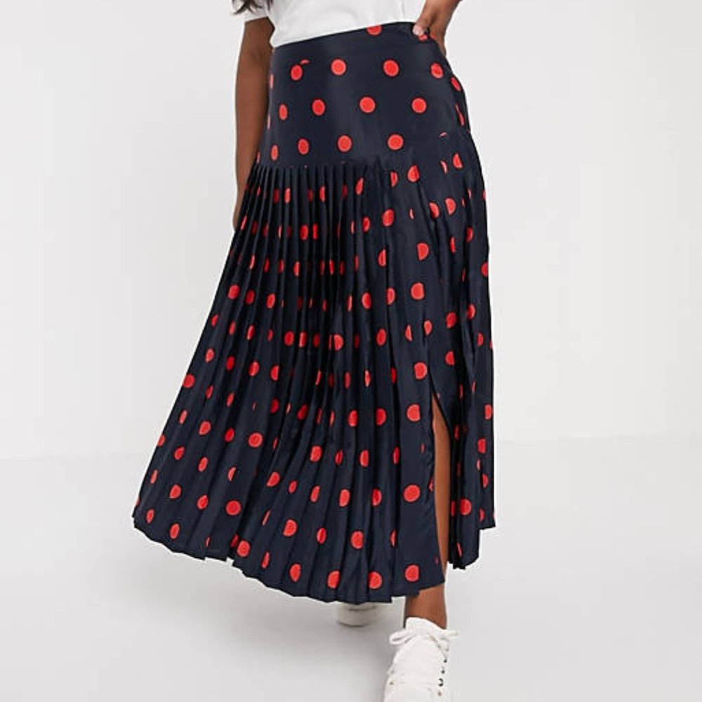 Pleated midi skirt with split in spot print